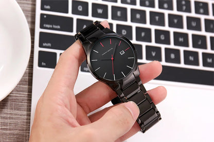Montre pour homme Hannah Martin, boîtier en acier inoxydable, mouvement à quartz, cadran de 41 mm, style professionnel, avec affichage du calendrier (imitation)