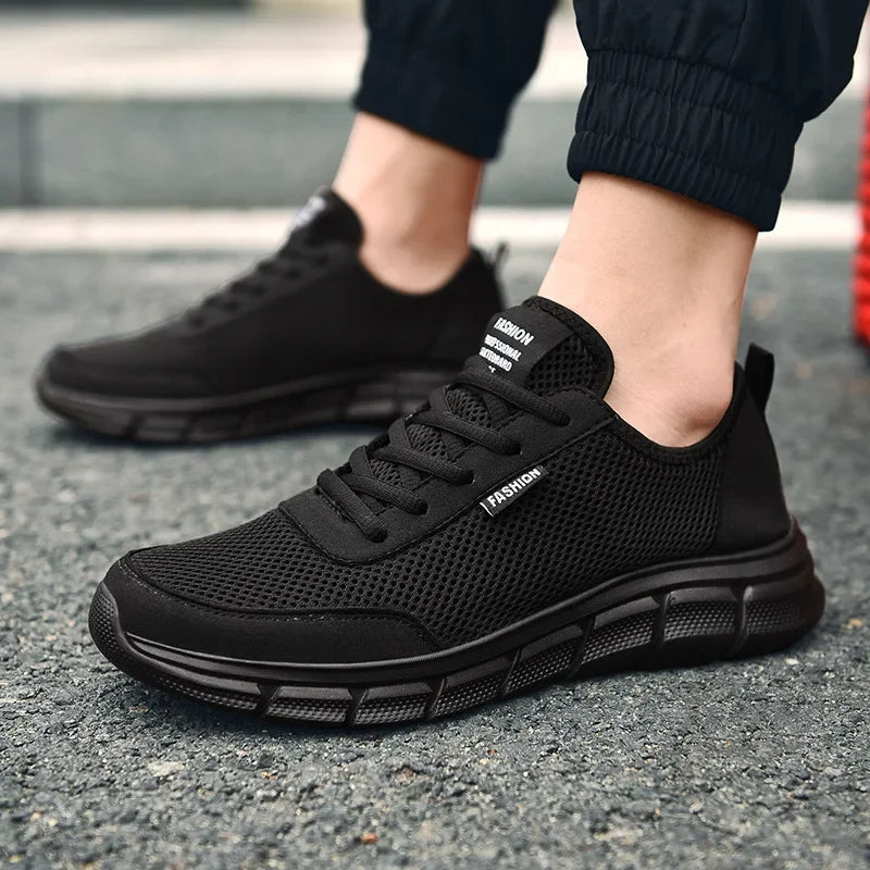 Nouvelle maille hommes chaussures Lac-up chaussures décontractées hommes baskets respirant chaussures légères confortables Sport formateurs Zapatillas Hombre