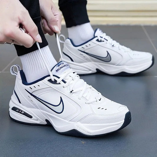 Nike Air Monarch 4 bijelo-mornarsko tkanina, koža, retro klasične niske tenisice za muškarce, plavo-bijele, 415445-102