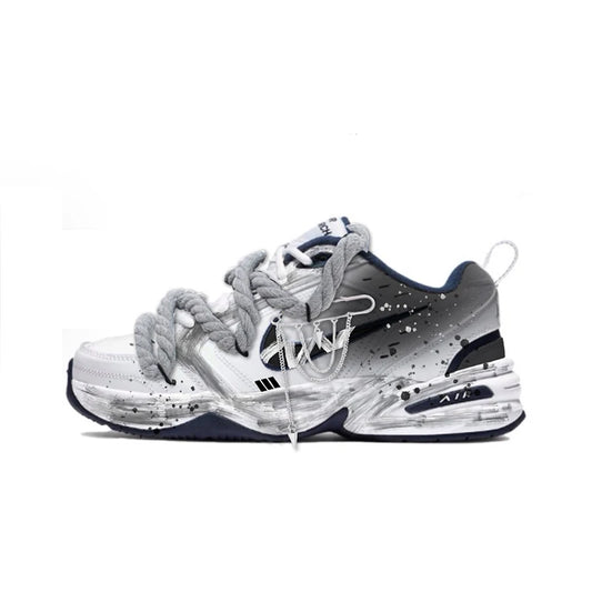 Skräddarsydda sneakers Nike Air Monarch 4, dekonstruerad design med bläckstänk, halkfria och slitstarka låga unisex-löparskor