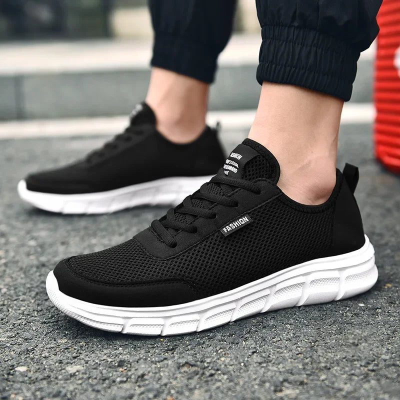 Nouvelle maille hommes chaussures Lac-up chaussures décontractées hommes baskets respirant chaussures légères confortables Sport formateurs Zapatillas Hombre